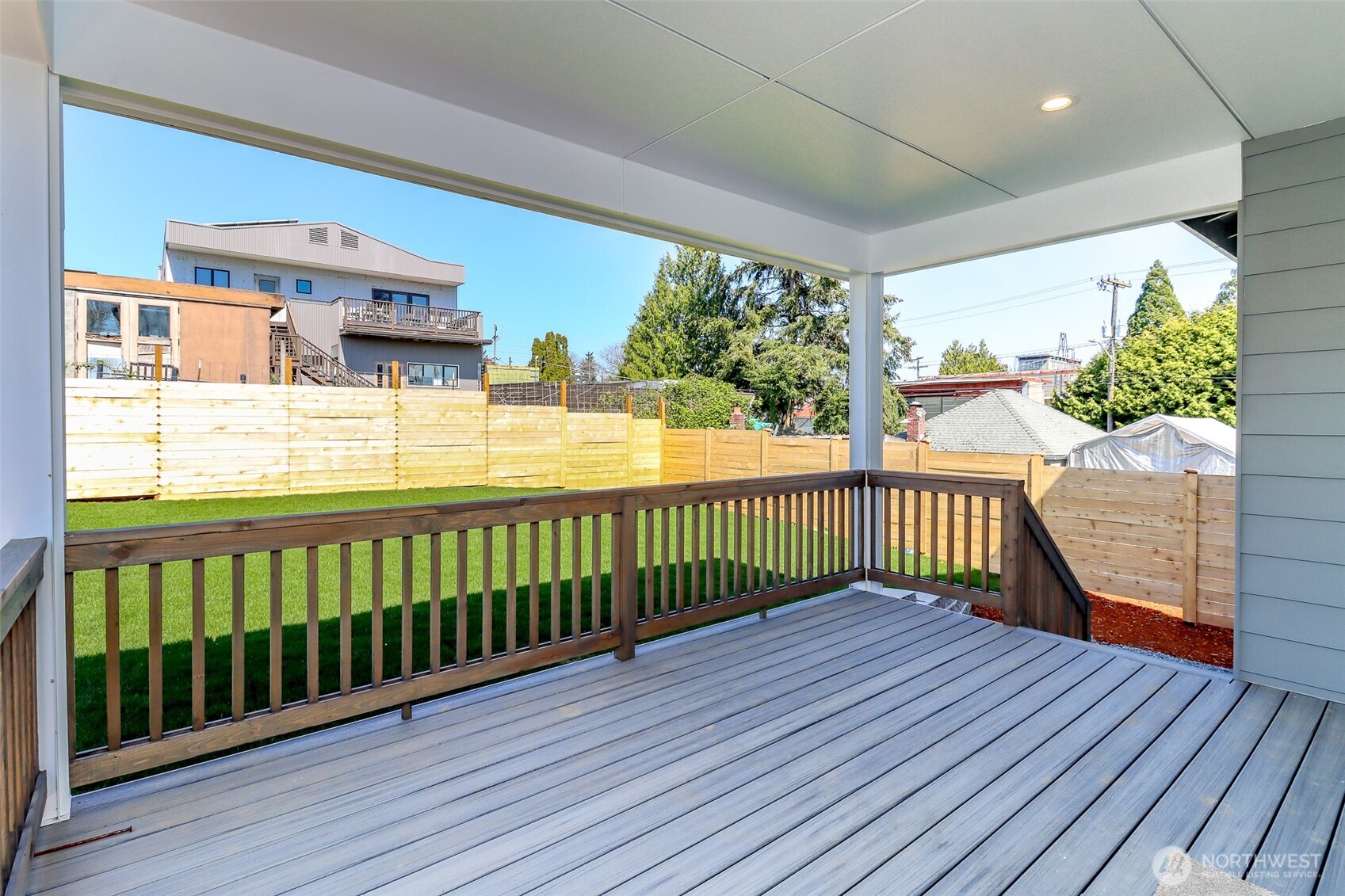 124 South 108th Place Seattle, WA 98168 - Photo 35 of 38 a view of a balcony with wooden floor
