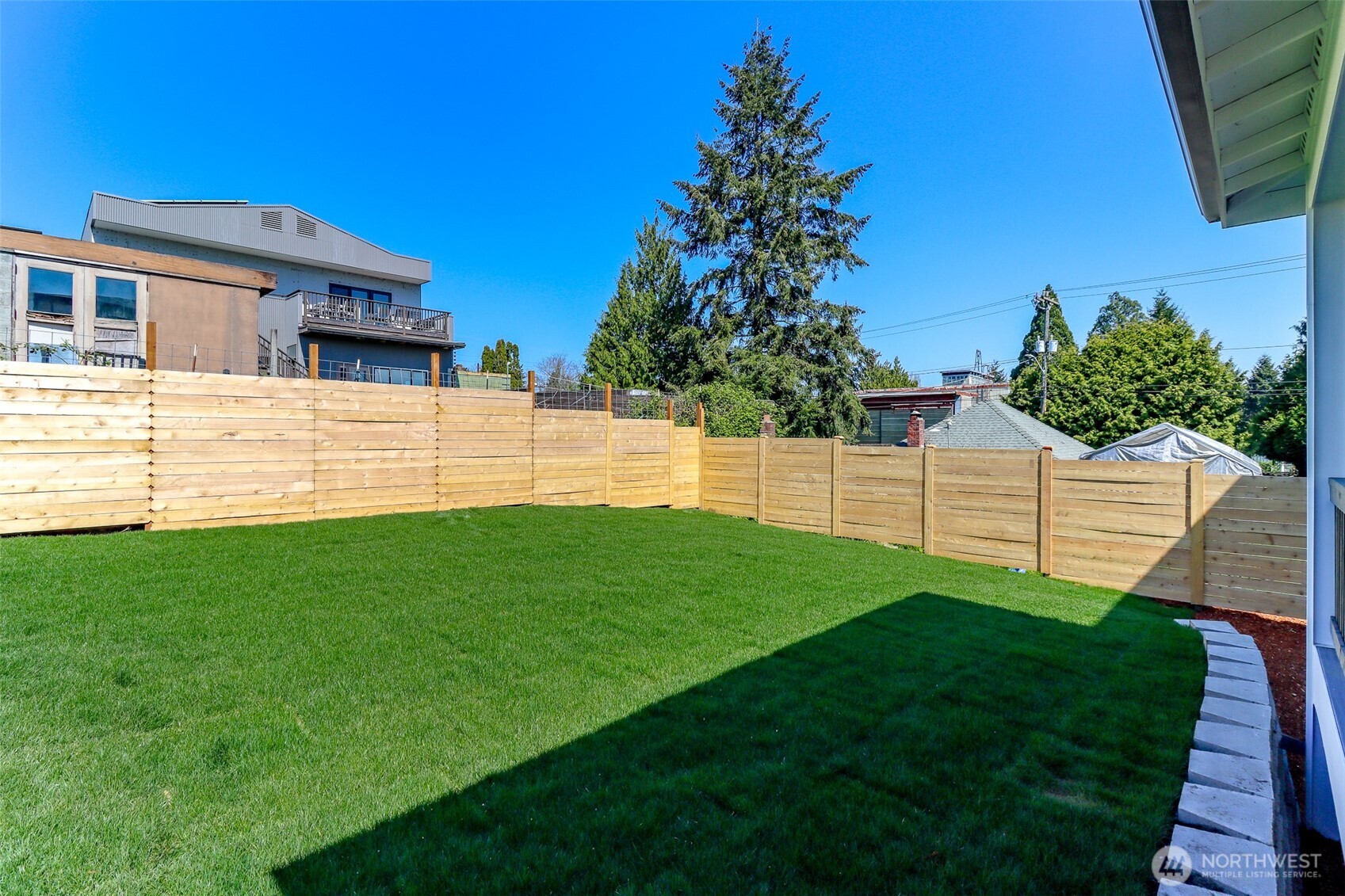 124 South 108th Place Seattle, WA 98168 - Photo 38 of 38 a view of a backyard with a garden