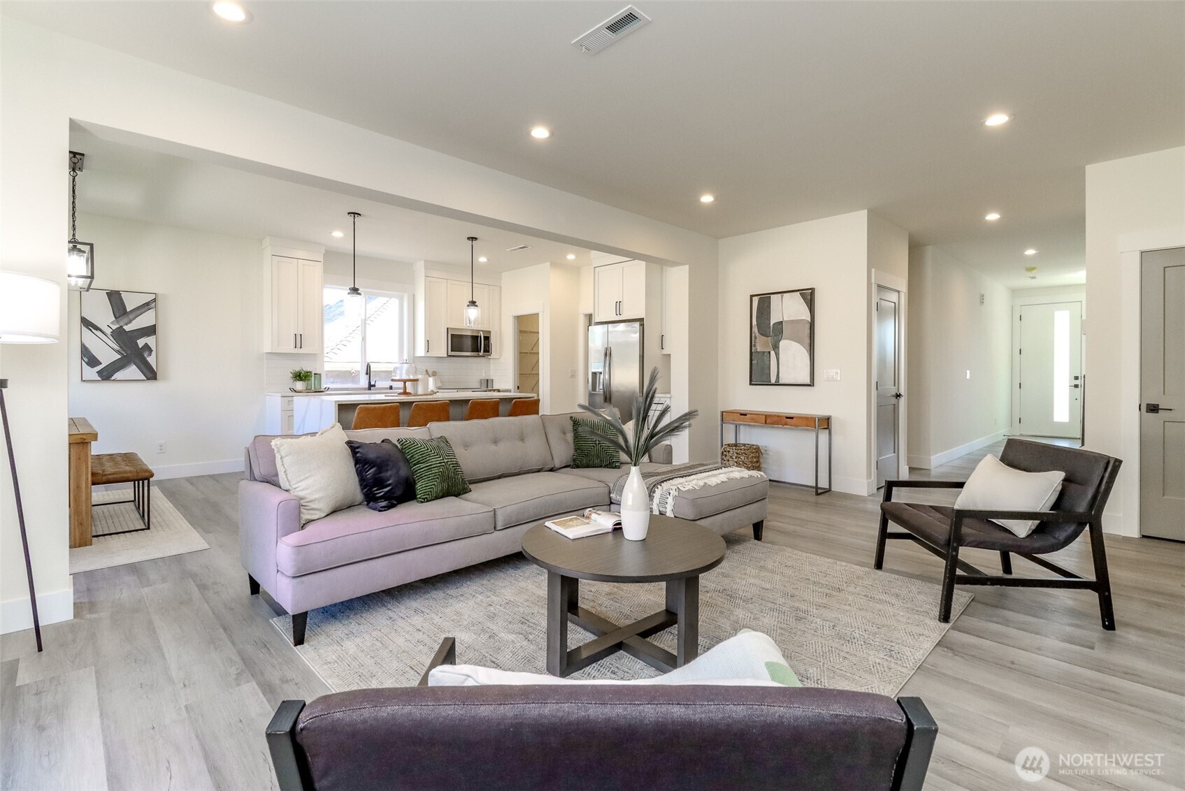 124 South 108th Place Seattle, WA 98168 - Photo 5 of 38 a living room with furniture and wooden floor
