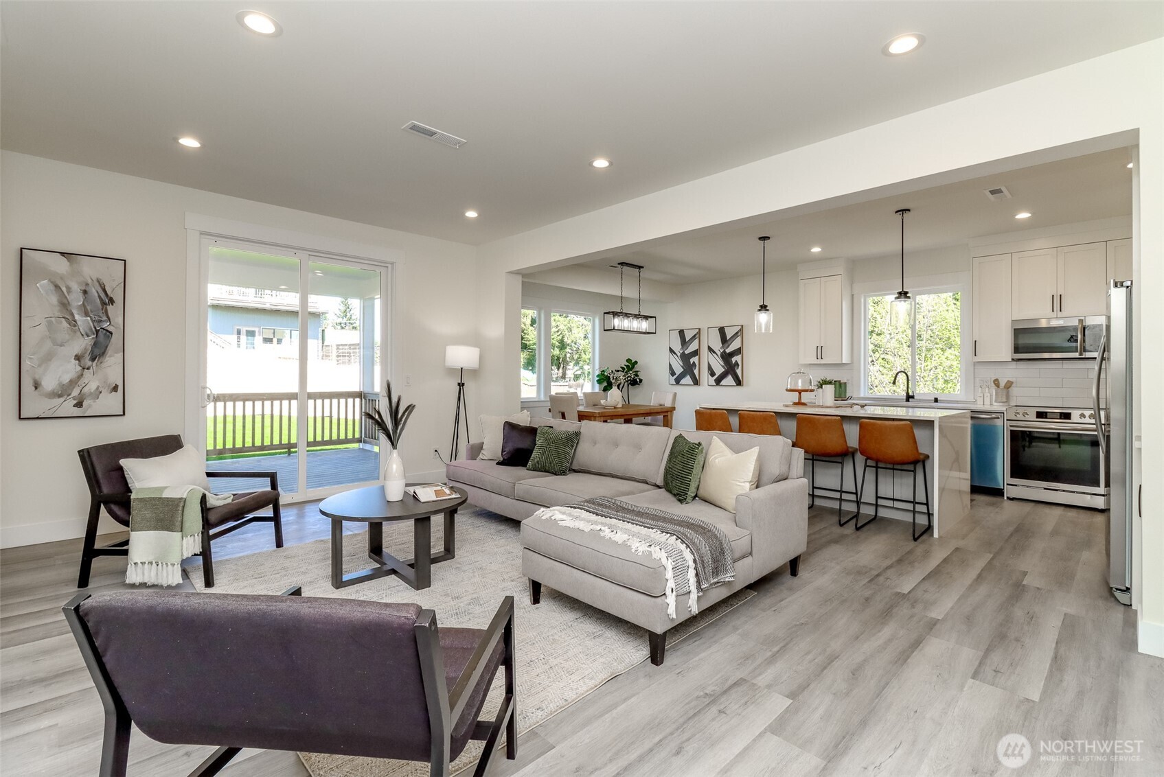 124 South 108th Place Seattle, WA 98168 - Photo 6 of 38 a living room with furniture and a large window