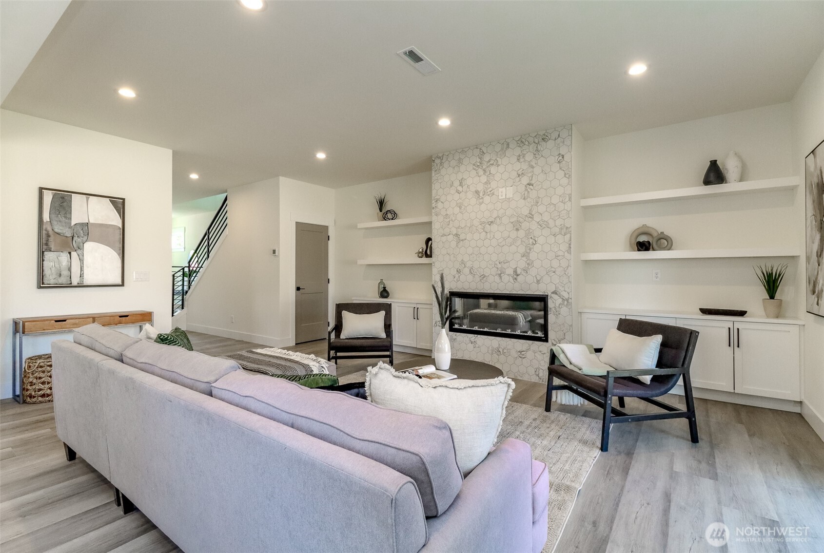 124 South 108th Place Seattle, WA 98168 - Photo 9 of 38 a living room with furniture and a wooden floor