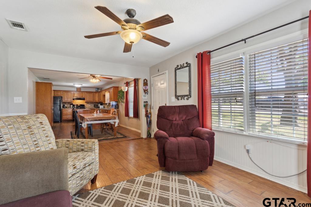 301 Bascom Road Whitehouse, TX 75791 - Photo 11 of 31 a living room with furniture and a large window