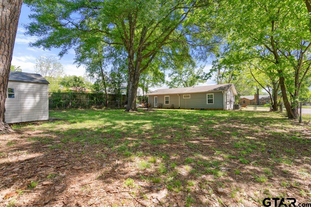 301 Bascom Road Whitehouse, TX 75791 - Photo 24 of 31 a house view with a garden
