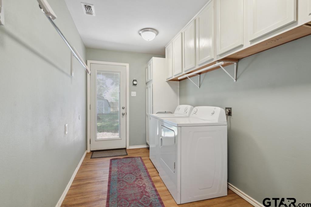 301 Bascom Road Whitehouse, TX 75791 - Photo 8 of 31 a utility room with dryer and washer