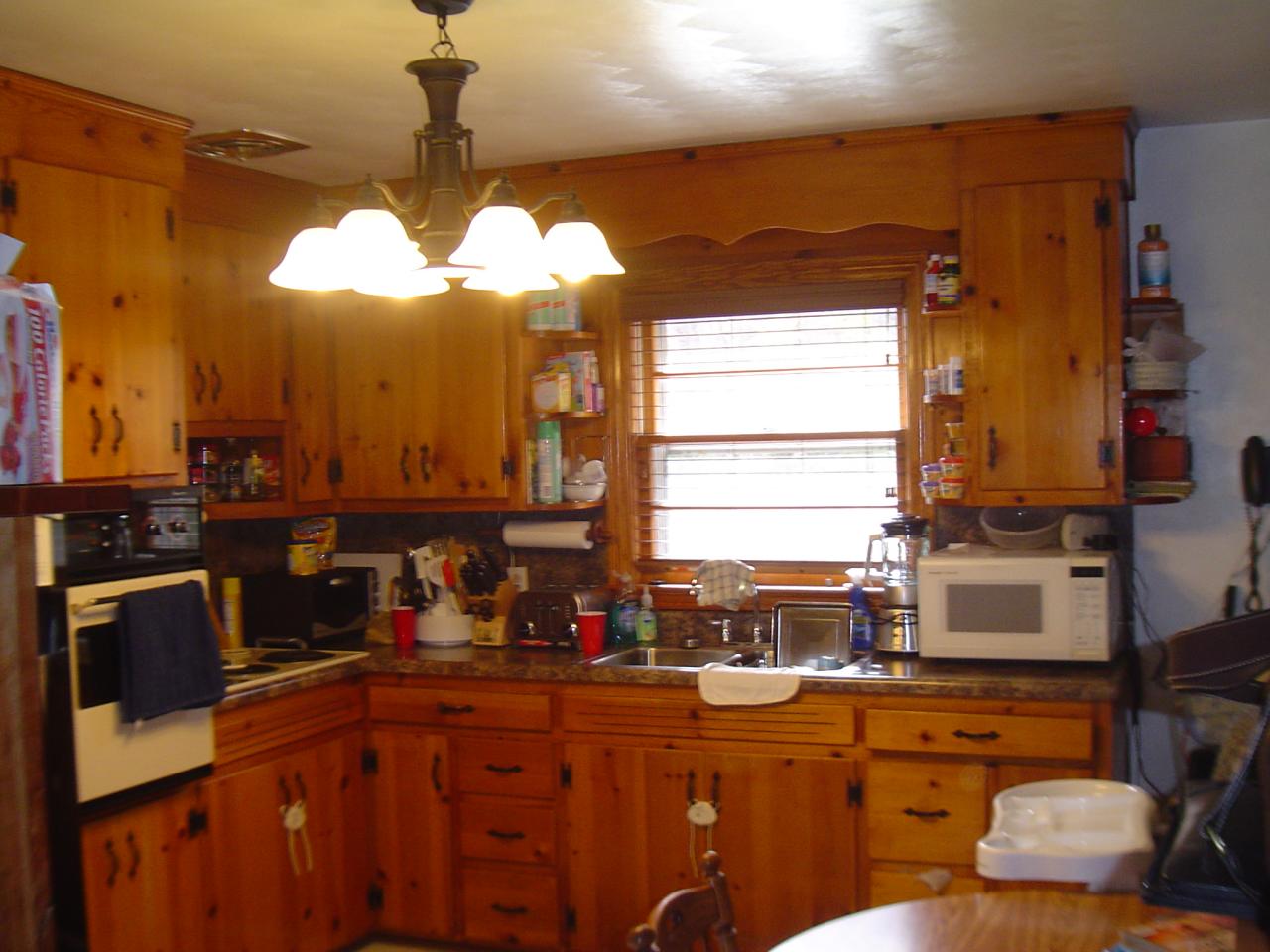 841 Horseshoe Point Road Henry, VA 24102 - Photo 2 of 12 a kitchen with a refrigerator and a stove