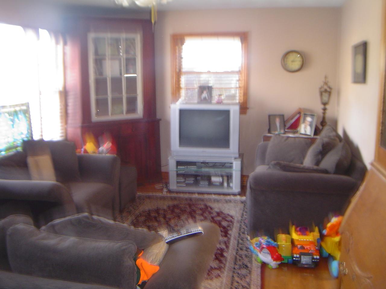 841 Horseshoe Point Road Henry, VA 24102 - Photo 3 of 12 a living room with furniture and a flat screen tv
