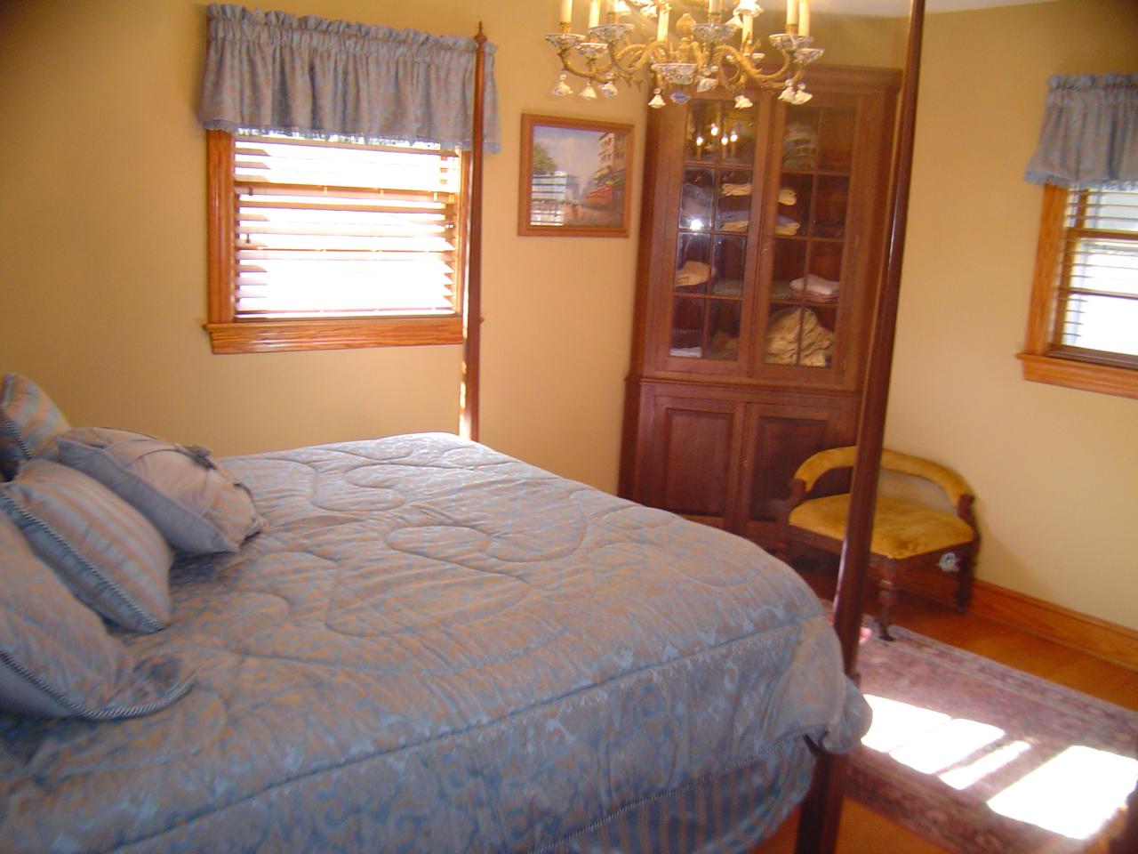 841 Horseshoe Point Road Henry, VA 24102 - Photo 5 of 12 a bedroom with a bed and wooden floor