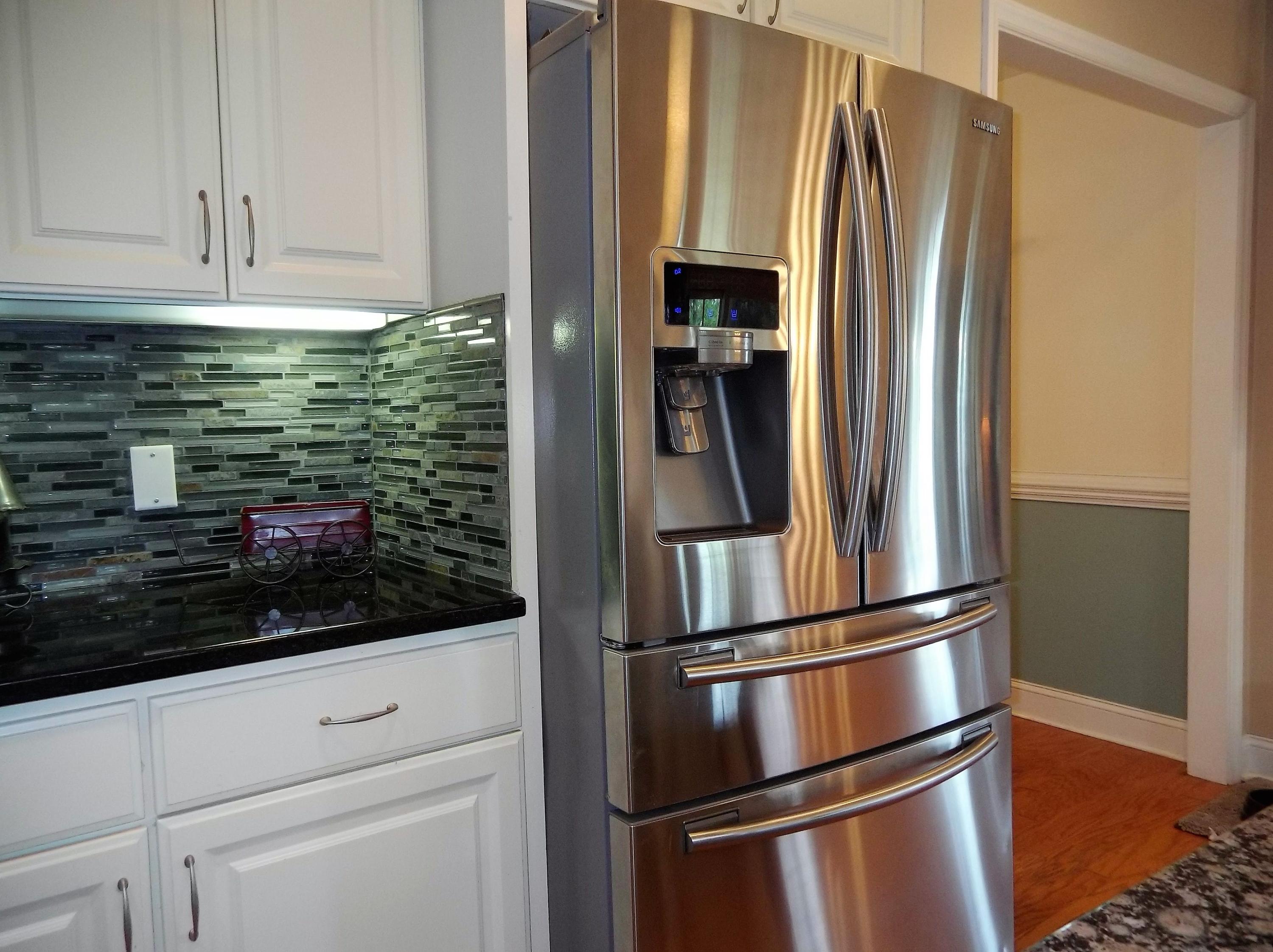 229 B Foxfire Road Aberdeen, NC 28315 - Photo 14 of 47 French door refrigerator with freezer on the bottom and chilling drawer in the middle.