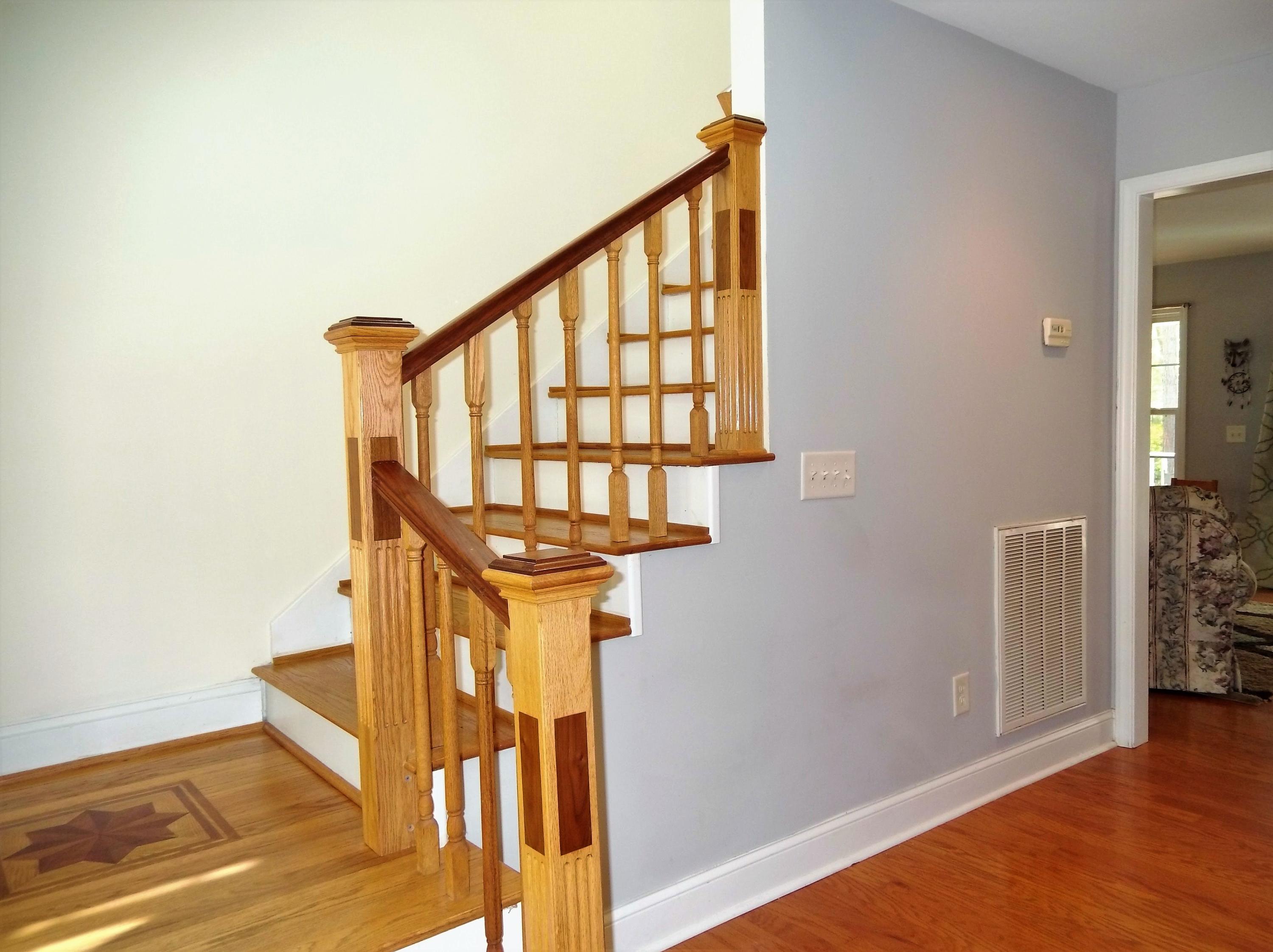 229 B Foxfire Road Aberdeen, NC 28315 - Photo 28 of 47 Wood rails, treads, pickets - love the handcrafted touches.