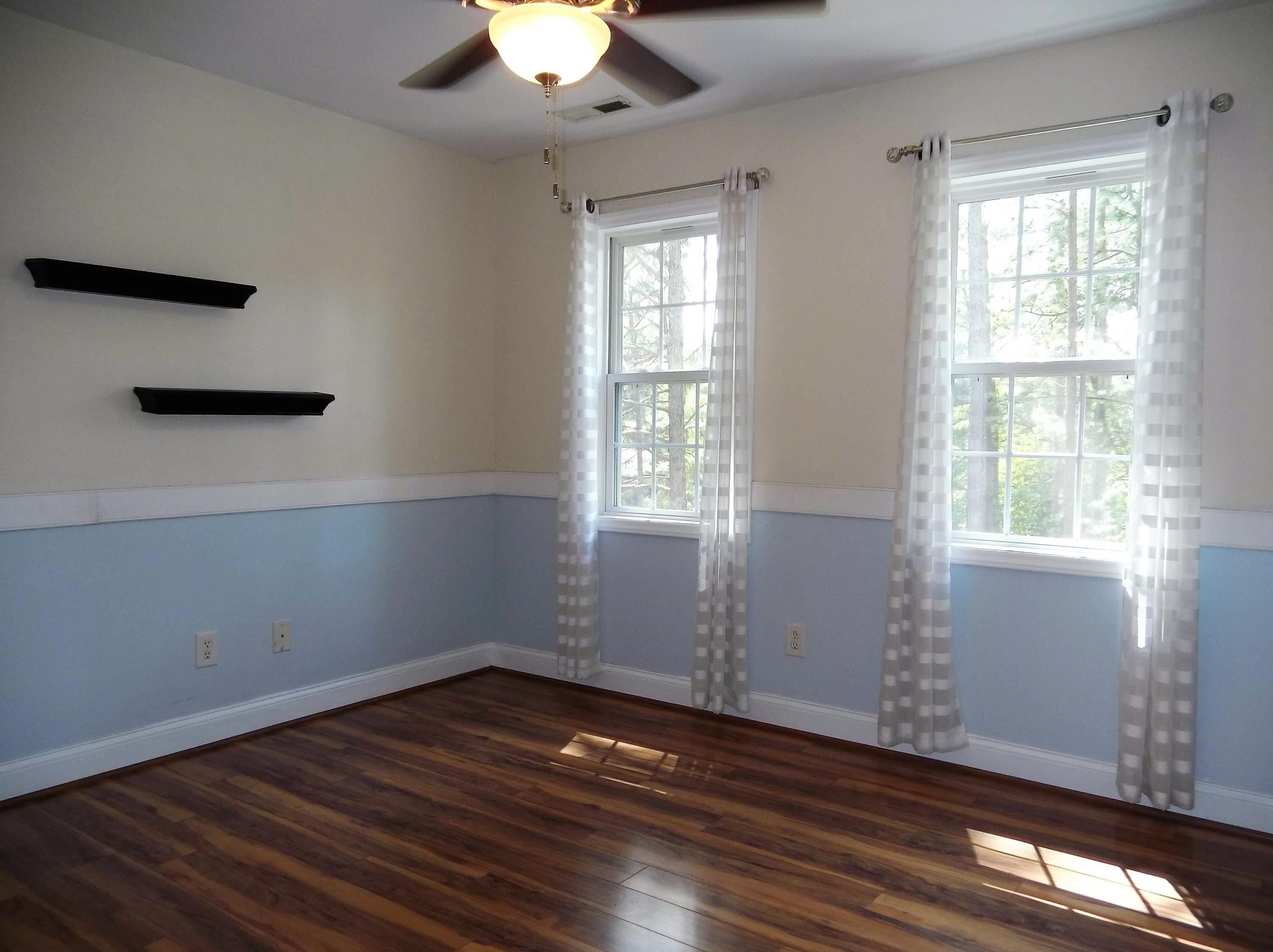 229 B Foxfire Road Aberdeen, NC 28315 - Photo 31 of 47 Upstairs bedroom accented with chair rail.