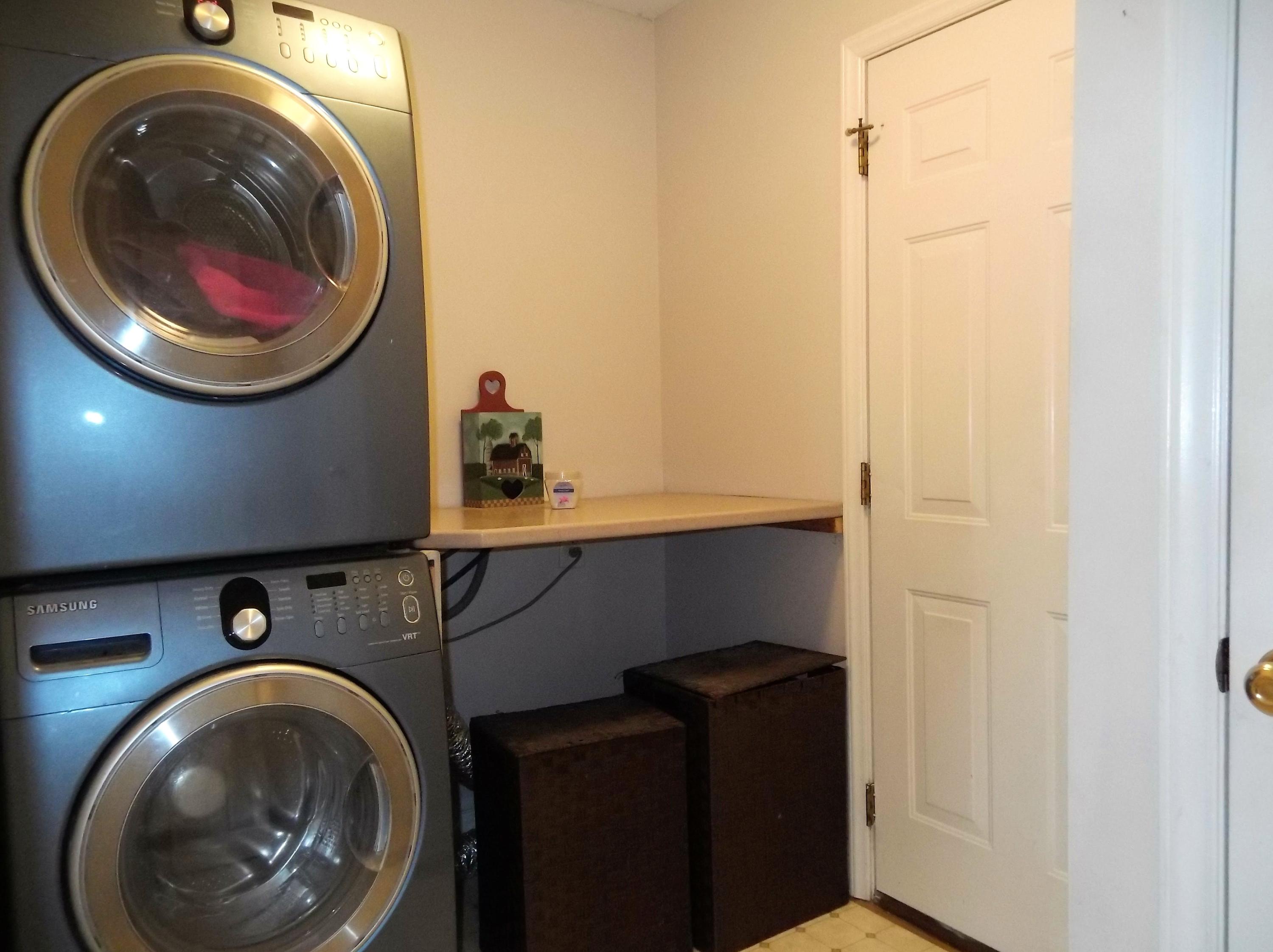 229 B Foxfire Road Aberdeen, NC 28315 - Photo 39 of 47 Coat closet, stackable W/D, leads to the garage.