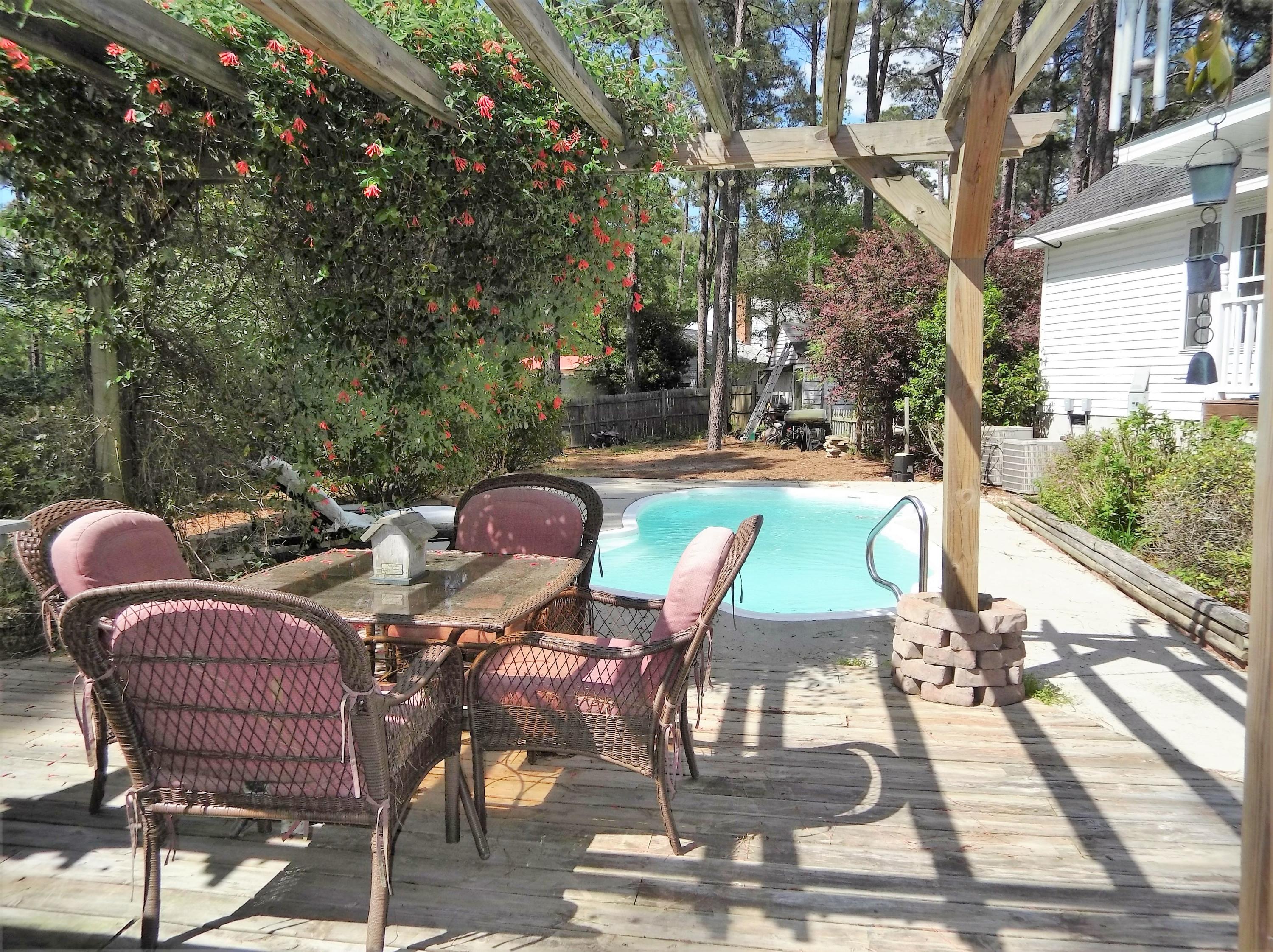 229 B Foxfire Road Aberdeen, NC 28315 - Photo 41 of 47 Summertime FUN! Large deck for dining next to the pool.