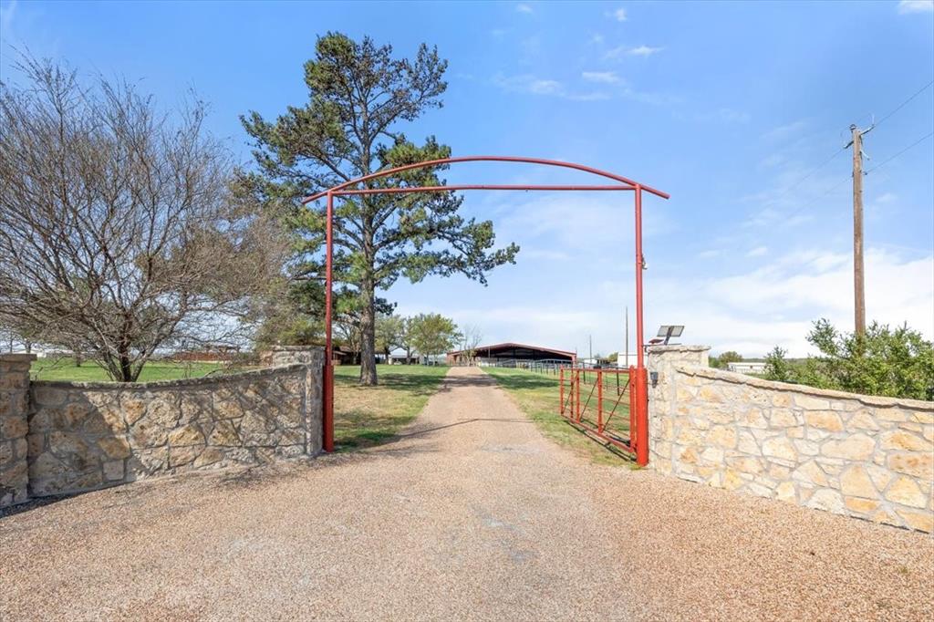 911 McVoid Road Springtown, TX 76082 - Photo 2 of 40 The Big Red Gate!