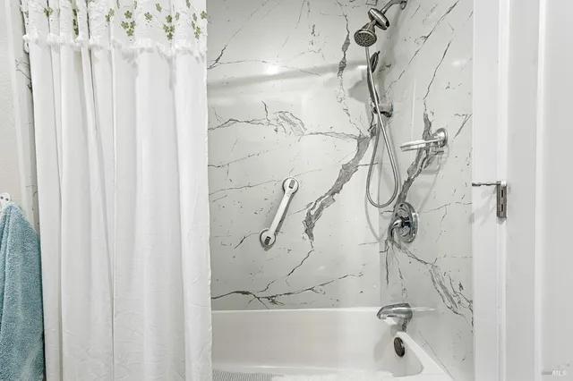 a bathroom with a bathtub