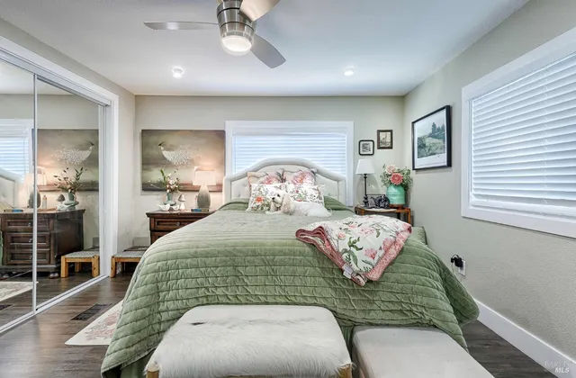 a bedroom with a bed and window