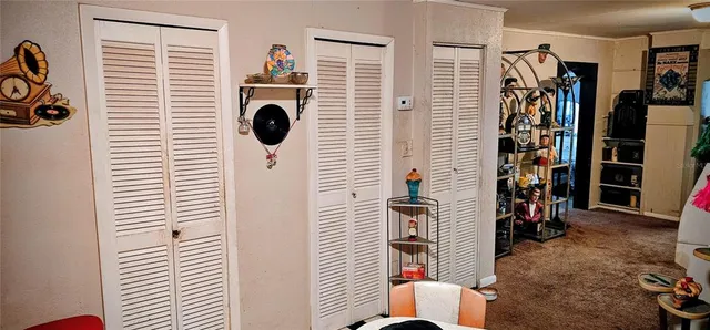 a view of a hallway with washer and dryer