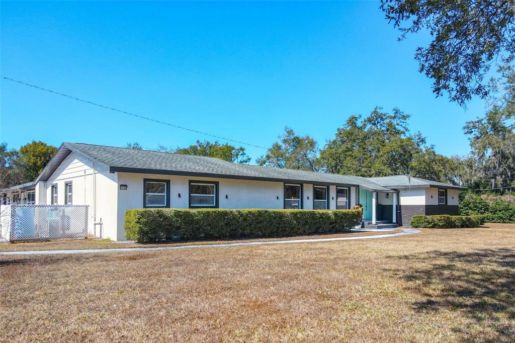1700 South Miller Road Valrico, FL 33594 - Photo 11 of 53 front view of house with a yard