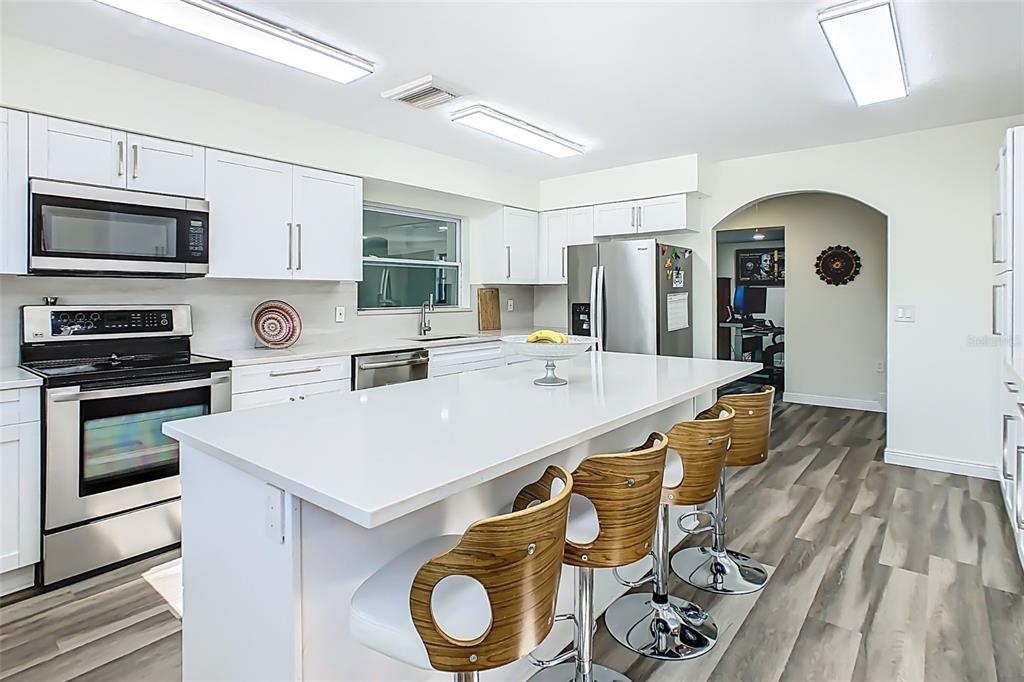 1700 South Miller Road Valrico, FL 33594 - Photo 17 of 53 a kitchen with a sink appliances and cabinets