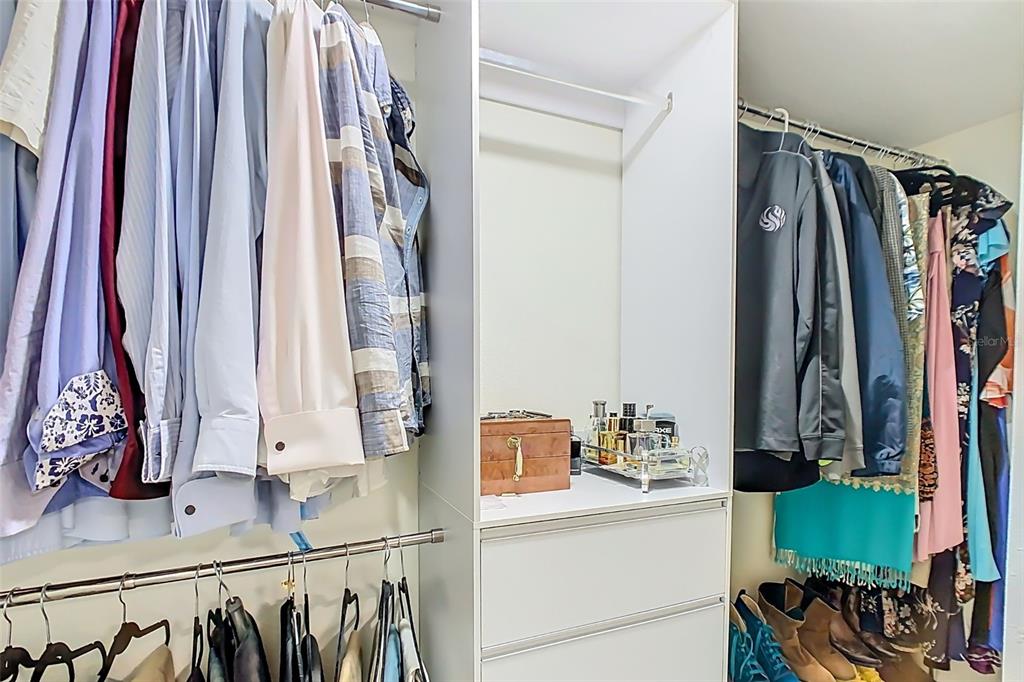 1700 South Miller Road Valrico, FL 33594 - Photo 22 of 53 a view of walk in closet with clothes and shoes