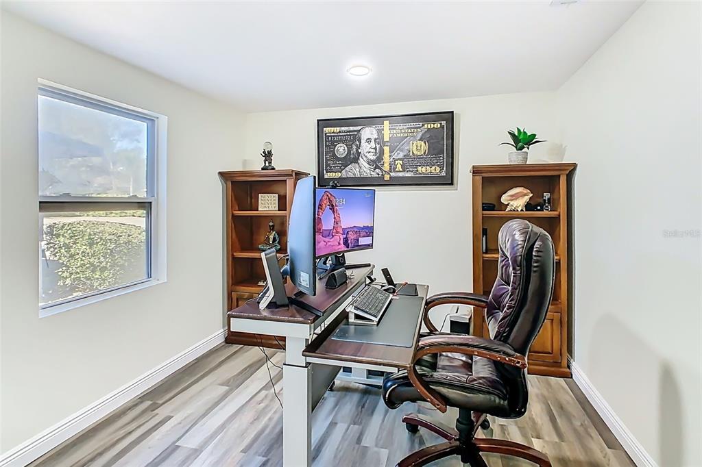 1700 South Miller Road Valrico, FL 33594 - Photo 29 of 53 a view of workspace with wooden floor windows