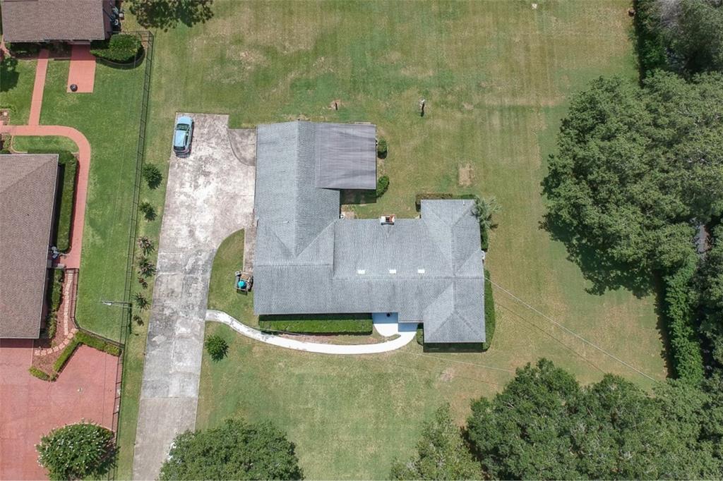 1700 South Miller Road Valrico, FL 33594 - Photo 3 of 53 an aerial view of a house with a yard
