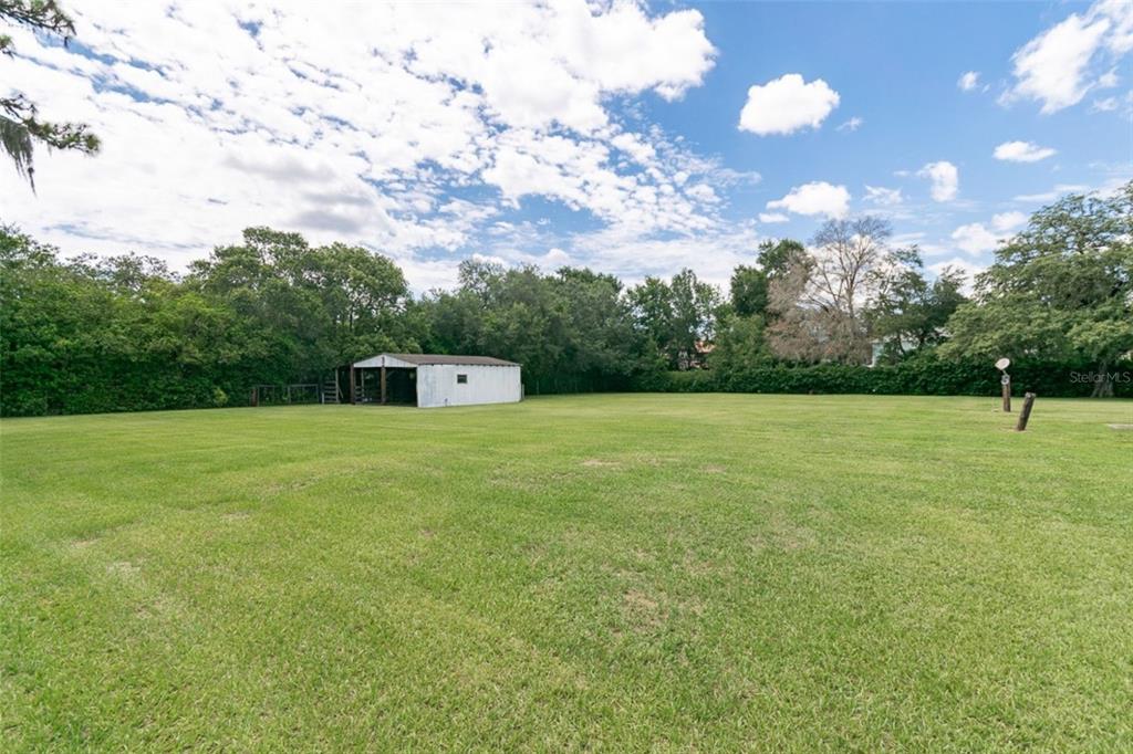 1700 South Miller Road Valrico, FL 33594 - Photo 41 of 53 a front view of a house with a yard