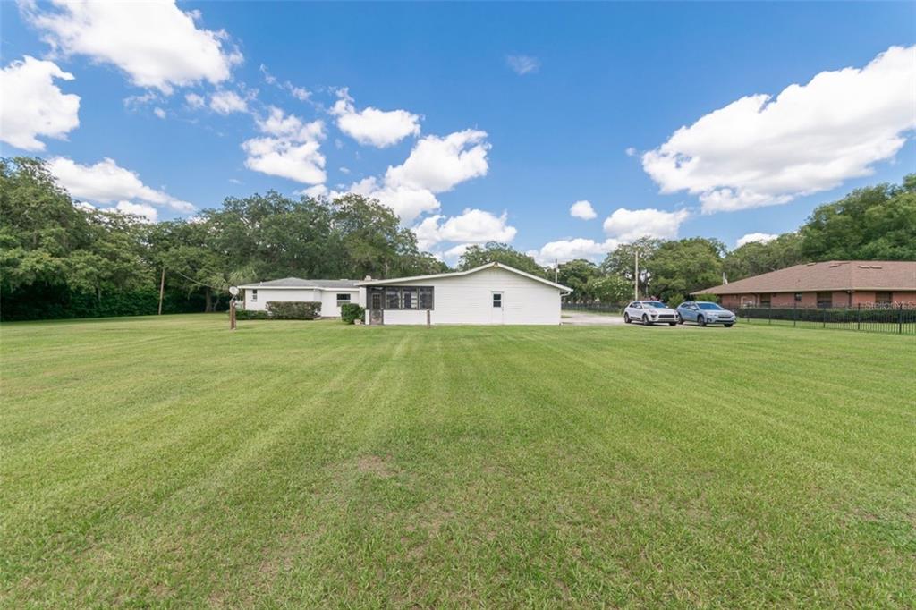 1700 South Miller Road Valrico, FL 33594 - Photo 43 of 53 a view of a house with a yard