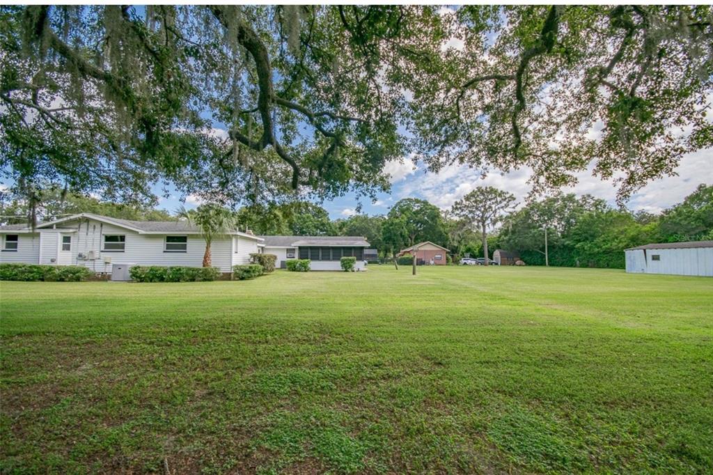 1700 South Miller Road Valrico, FL 33594 - Photo 45 of 53 a front view of a house with a yard