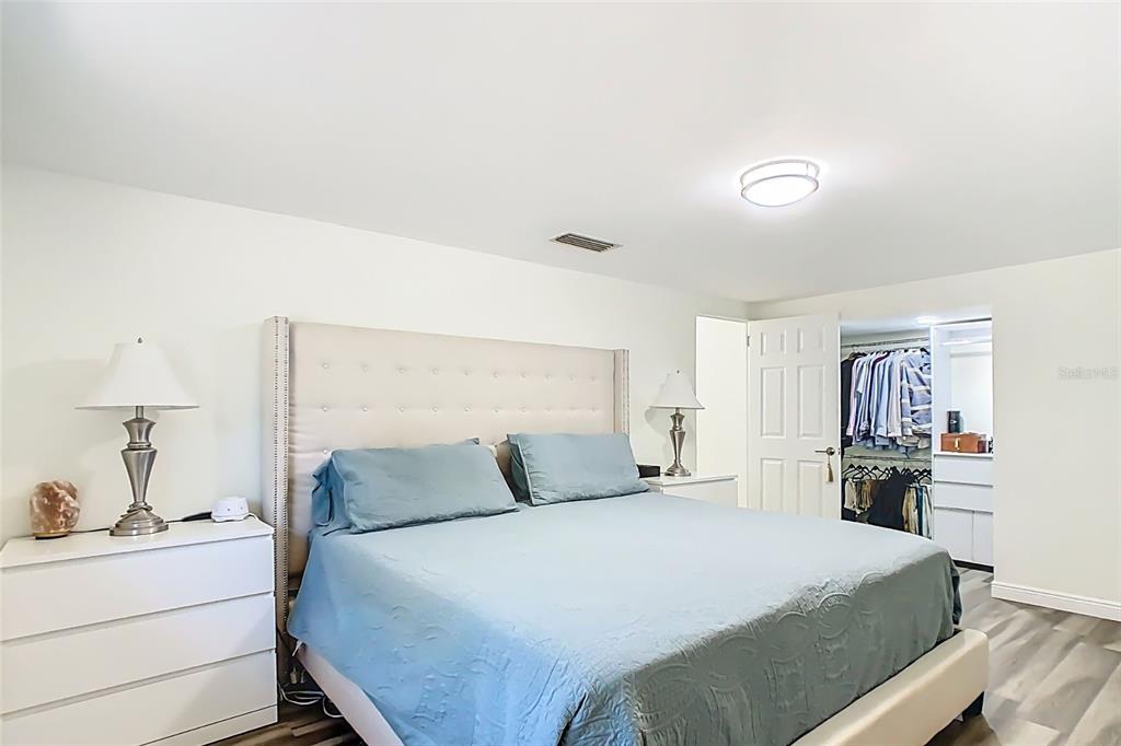 1700 South Miller Road Valrico, FL 33594 - Photo 8 of 53 a bedroom with a bed and a dresser