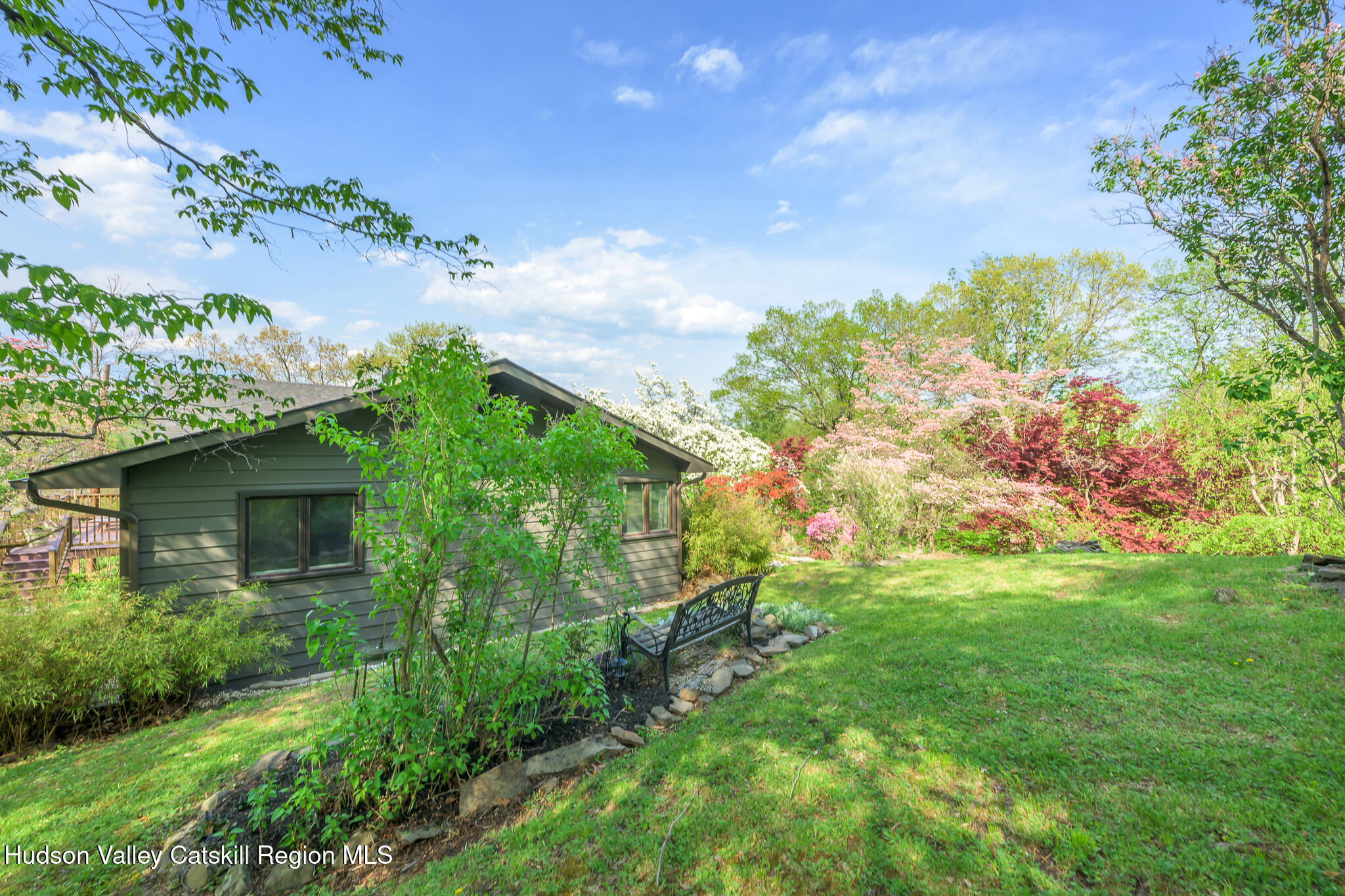 29 Edgemere Hill Road Catskill, NY 12414 - Photo 3 of 38 a backyard of a house with lots of green space and mountain view