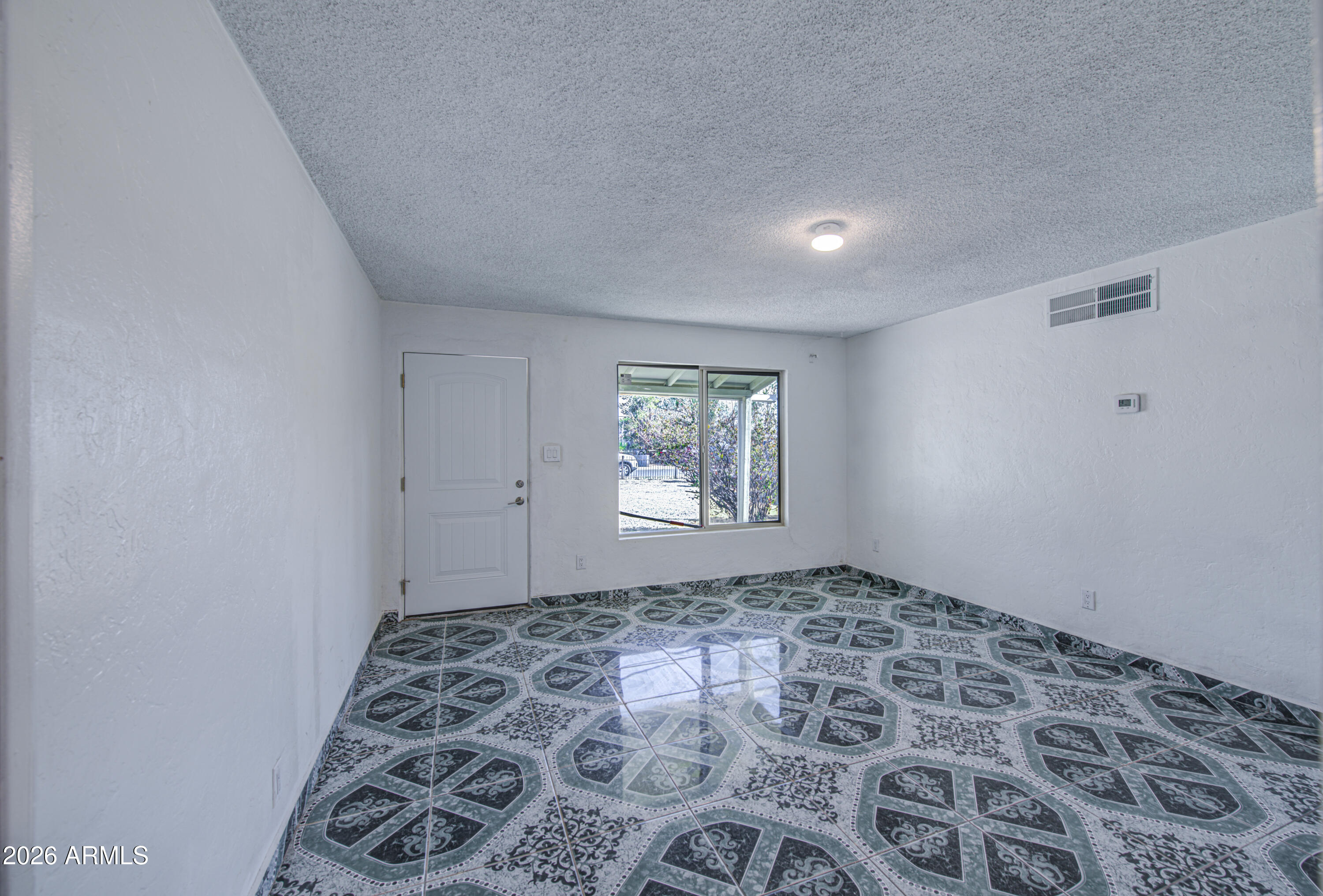 3204 West Monte Vista Road Phoenix, AZ 85009 - Photo 6 of 42 Living Room 1