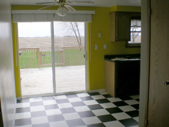 6838 Tipple Road Rockford, IL 61102 - Photo 3 of 6 a black and white checkered floor