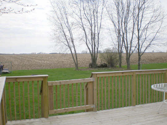6838 Tipple Road Rockford, IL 61102 - Photo 5 of 6 a view of a balcony with an outdoor space