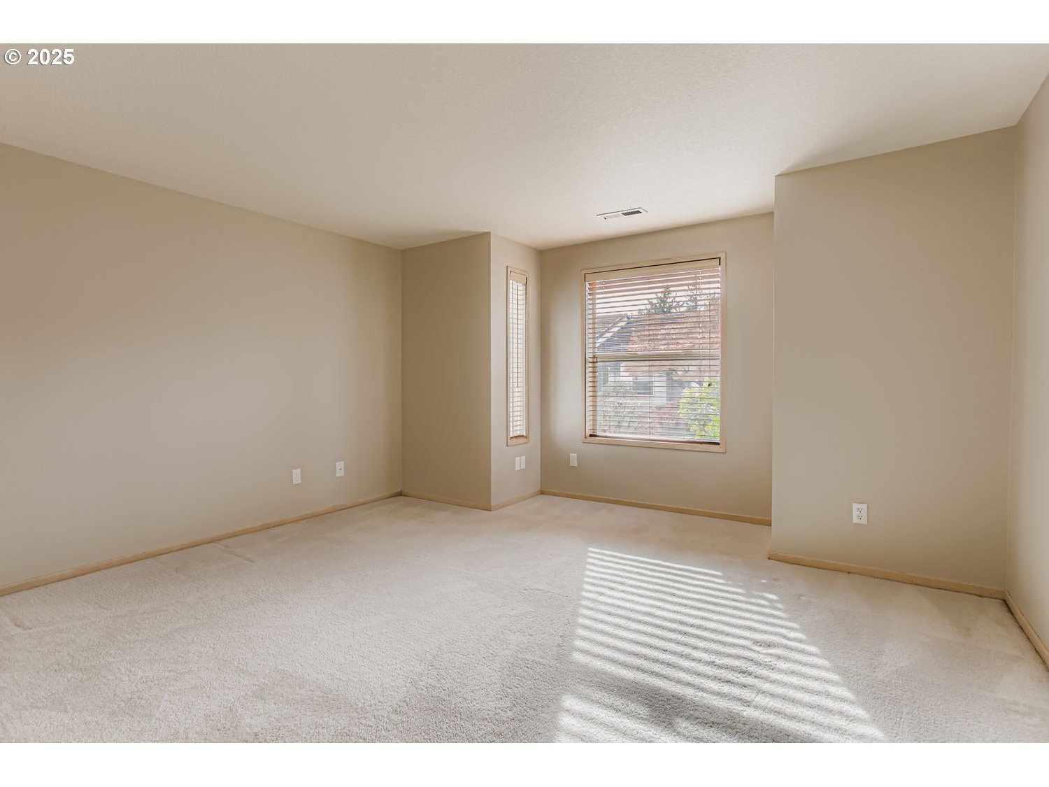15917 Northeast Union Road, Unit 113 Ridgefield, WA 98642 - Photo 18 of 27 a view of an empty room with a window