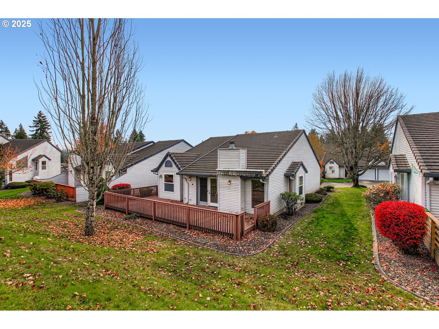 15917 Northeast Union Road, Unit 113 Ridgefield, WA 98642 - Photo 26 of 27 a front view of a house with garden