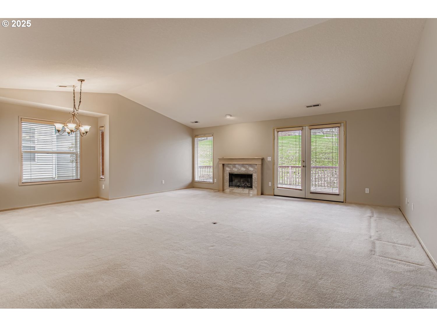 15917 Northeast Union Road, Unit 113 Ridgefield, WA 98642 - Photo 4 of 27 a view of empty room with a fireplace