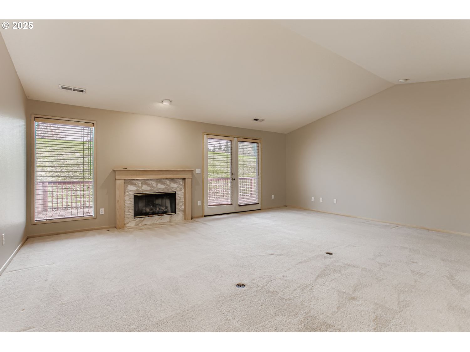 15917 Northeast Union Road, Unit 113 Ridgefield, WA 98642 - Photo 5 of 27 a view of empty room with a fireplace