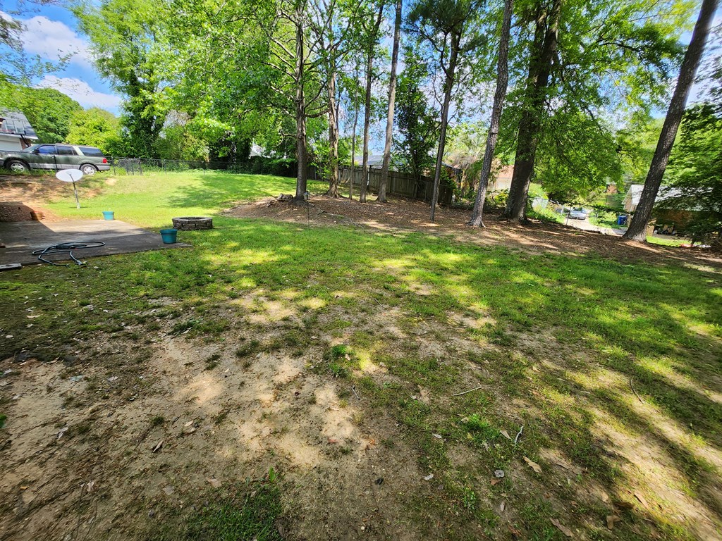 7312 Cedar Creek Loop Columbus, GA 31904 - Photo 17 of 17 a view of a tree in a yard