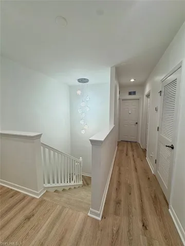 a view of entryway with wooden floor