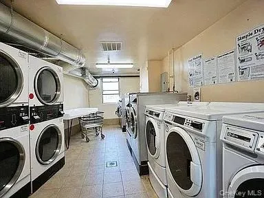 a view of a washer and dryer in a utility room