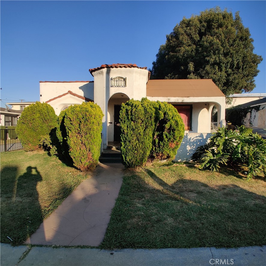 602 North Sloan Avenue Compton, CA 90221 - Photo 1 of 1 a view of a house with a yard