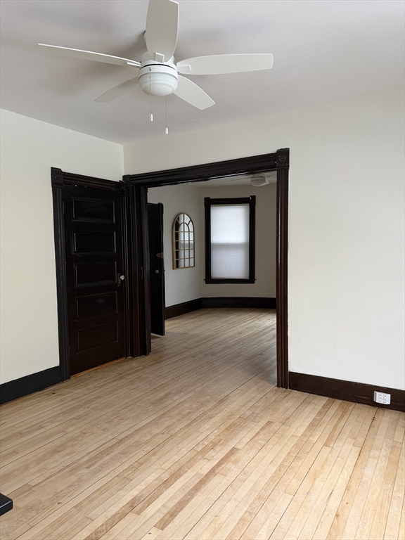 53 Barclay Street, Unit 1 Worcester, MA 01604 - Photo 8 of 17 a view of empty room with wooden floor