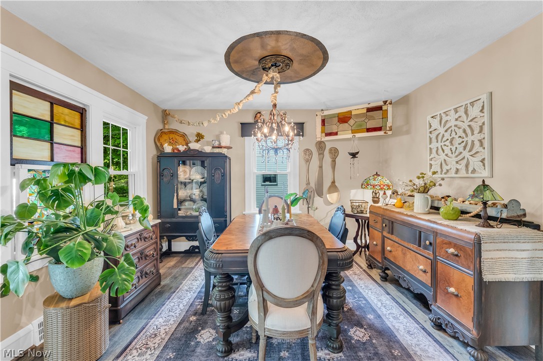1563 Commodore Road Lyndhurst, OH 44124 - Photo 6 of 37 Dining Area with glorious detailed ceiling and chandelier
