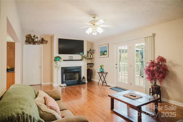 a bed room with a bed and a chandelier