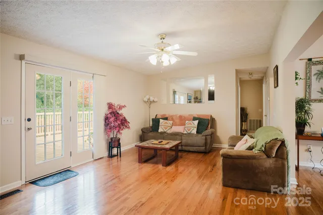 a bedroom with a large bed and a dresser