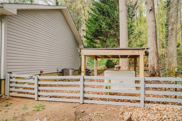$394,000 | 107 Sugar Mill Woods Drive, Zirconia, NC 28790