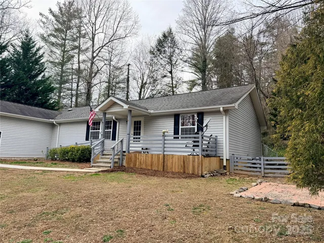 a view of a yard from a balcony