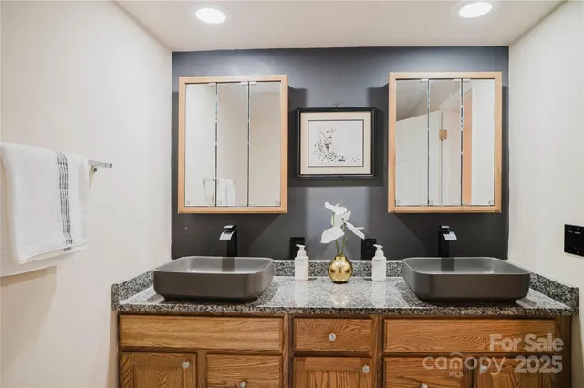 a view of yard with swimming pool and trees