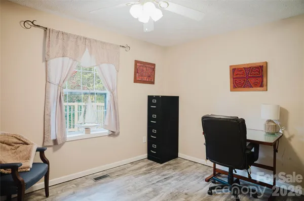 $394,000 | 107 Sugar Mill Woods Drive, Zirconia, NC 28790