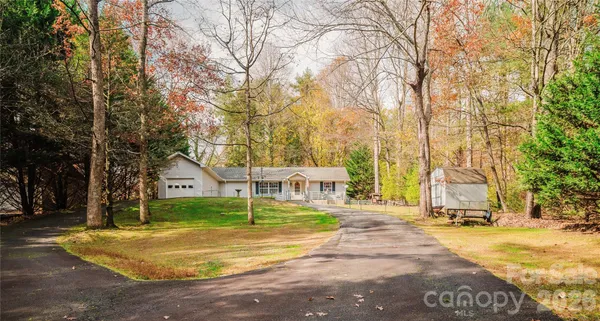 $394,000 | 107 Sugar Mill Woods Drive, Zirconia, NC 28790